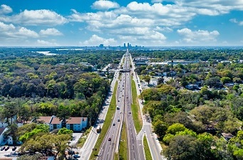 drone view of road beside RED BAY multifamily property