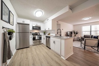 Kitchen and living room at Northlake apartments Jacksonville